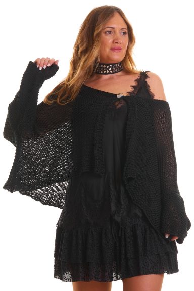Chaqueta calada Sildela: diseño elástico con manga murciélago, cierre de botón y corte asimétrico. Ligera, moderna y perfecta para cualquier look.
