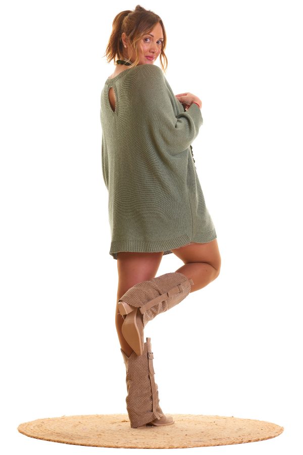 Jersey Balbina: jersey calado elástico con manga murciélago y apertura decorativa en la espalda. Ligero, cómodo y perfecto para un look sofisticado.