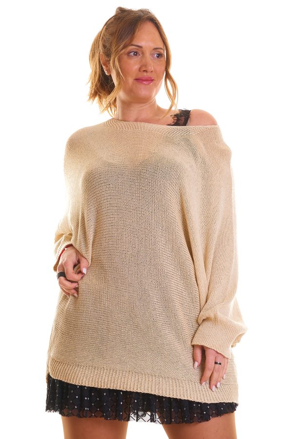 Jersey Balbina: jersey calado elástico con manga murciélago y apertura decorativa en la espalda. Ligero, cómodo y perfecto para un look sofisticado.