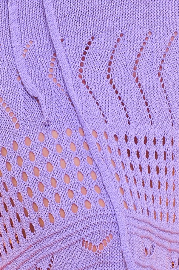 Vestido Caleta: diseño de punto elástico con escote en pico, transparencias sutiles y sin forro. Perfecto para usar sobre bikini, traje de baño o con combinaciones.