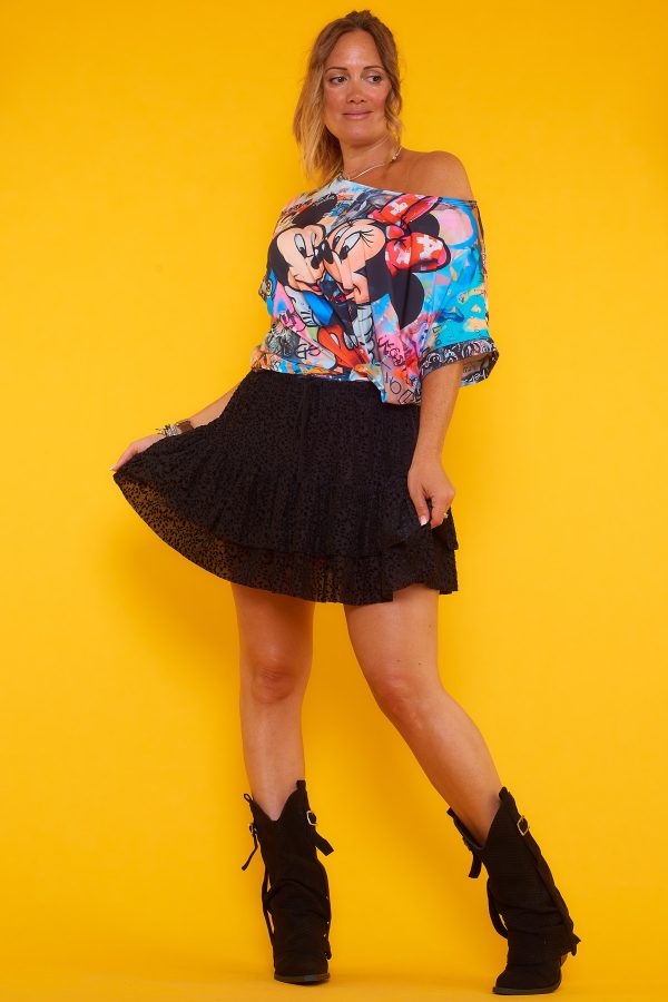 Falda Pantalón de tul con tejido elástico de volantes y estampado de flores con terciopelo, cintura ajustable y tejido ligero.