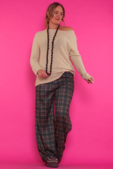 Pantalón Chándal Estampado Barnes Un pantalón elástico de estilo chándal que tiene un estampado de cuadros. Es de pierna recta y tiene una goma elástica en la cintura.