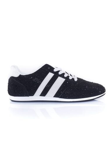 Atrévete a brillar con las zapatillas Alok Negro de Nunu Santander. Calzado cómodo con pedrería para un estilo boho-chic único. ¡Pisa fuerte con glamour!