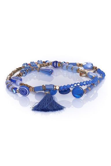 Añade un toque boho chic a tu estilo con la pulsera Neuf 10. Sus abalorios y borla te darán un look único y fresco. Perfecta para realzar cualquier conjunto.