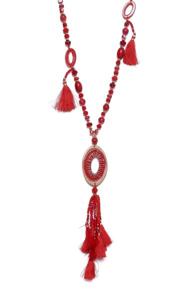 Añade un toque boho-chic a tu estilo con el colgante Dieci de Nunu Santander. Un diseño vibrante con borlas y cuentas que realza cualquier look. ¡Descubre tu complemento ideal!