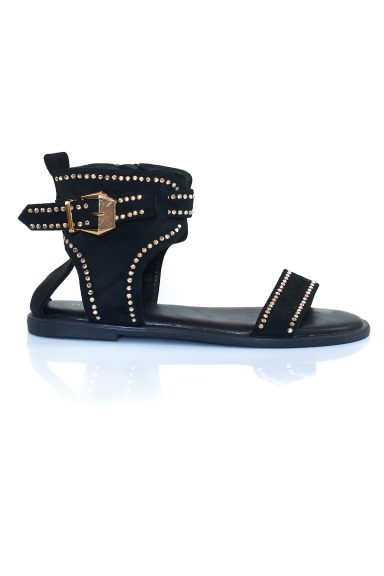 Atrévete con la Sandalia plana tachas Drift Negro. Un calzado cómodo y estiloso con pulsera al tobillo que añadirá un toque boho-chic a tus looks de verano. ¡Perfectas para ti!