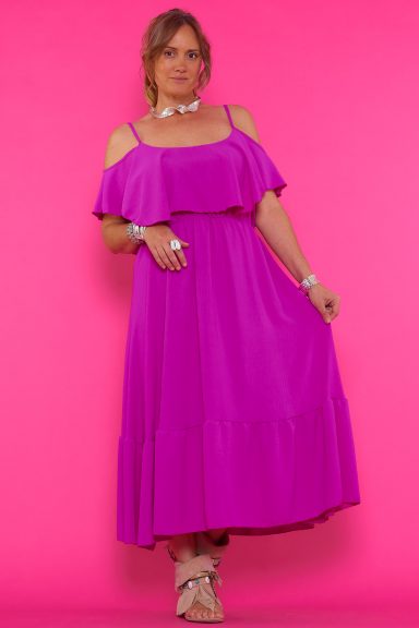 Descubre el Vestido Kiri, una pieza clave para tu estilo boho-chic. Con volantes en los hombros y silueta fluida, es perfecto para cualquier ocasión. Comodidad y estilo te esperan.