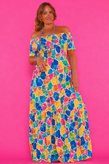 Descubre el vestido Amer, tu aliado perfecto para un estilo boho-chic. Con escote Bardot y estampado único, este maxi vestido de viscosa realza tu figura y ofrece máximo confort. ¡Ideal para cualquier ocasión!